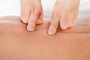 Person Receiving Shiatsu Treatment